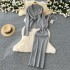 Lazy style dress set for women in winter 2024, with a high-end feel and straps, a waist cinching sweater jacket, and a suspender knit dress inside