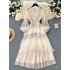 Elegant dress for socialite, female 2024 autumn French heavy industry embroidery flower mesh pleated fluffy skirt, knee length long skirt