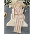 Lazy style dress set for women in winter 2024, with a high-end feel and straps, a waist cinching sweater jacket, and a suspender knit dress inside