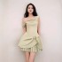 Vietnam's niche diagonal collar pleated patchwork short skirt with new temperament, off shoulder matcha green dress 40121