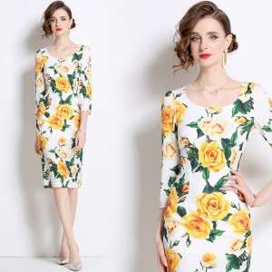 Real shot high waisted slim fit dress with eight quarter sleeves, U-neck print, and hip hugging skirt in stock