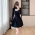 Realistic photo of 2024 autumn new French style black dress with slimming temperament dress paired with rose necklace 8301