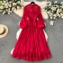 High end dress for women in early spring 2024, new style with a stand up collar, heart mechanism, pleated waist, long version, bubble sleeve dress