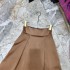 Design a pleated midi skirt with a high waist, retro and fashionable design. The side pockets have a hanging effect and the skirt is a large swing. A2 # 8751