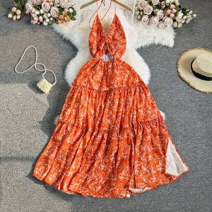 French backless floral suspender dress for women in summer, with a waist cinching and slimming style, exuding a super fairy split vacation style long skirt