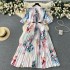 Light luxury retro temperament round neck short sleeved printed pleated dress for women with lace up and waist cinching temperament, grand and elegant long skirt