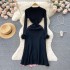 Knitted dress with women's design sense, looped long sleeves, high-end sense, contrasting color splicing, pleated skirt, temperament, slim fit, medium length skirt