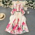 European and American court style floral dress with pleated waist and lantern sleeves for women. The design is niche, light luxury, super fairy, and grand skirt