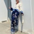 European and American cross-border spot women's clothing 2024 new fashion positioning printed loose long sleeved top wide leg pants two-piece set