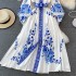 Spring new palace style blue and white porcelain printed stand up collar single breasted dress with elegant temperament and large swing long skirt