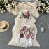 Spring and summer vacation ethnic style hook flower tassel knitted sweater set, women's hanging neck tie vest+short skirt two-piece set