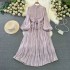 High end dress for women in early spring 2024, new style with a stand up collar, heart mechanism, pleated waist, long version, bubble sleeve dress