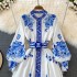 Spring new palace style blue and white porcelain printed stand up collar single breasted dress with elegant temperament and large swing long skirt