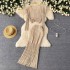 European and American style simple and fashionable thin knitted suit for women, with a distressed design and a high waist slimming long skirt