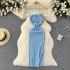 Spring and summer temperament socialite hanging neck hollowed out strapless bag buttocks long skirt for women, tight and sexy backless slit knitted long skirt