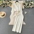 French lazy style high-end set for women's autumn and winter loose long sleeved knitted sweater top+mid length skirt