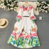 European and American court style floral dress with pleated waist and lantern sleeves for women. The design is niche, light luxury, super fairy, and grand skirt