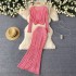 European and American style simple and fashionable thin knitted suit for women, with a distressed design and a high waist slimming long skirt