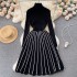 Retro socialite style striped knitted dress for women in autumn and winter, with a semi high neck design and a grand display of super fairy temperament, long skirt