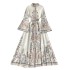 Spring new retro printed round neck flared sleeve dress for women's singles with large buttons and irregular pleated long skirt