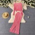 European and American style simple and fashionable thin knitted suit for women, with a distressed design and a high waist slimming long skirt