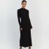 European and American style 2023 autumn and winter knitted black fungus edge dress with waist cinching, high collar, messy pit, slimming and slimming, knitted long skirt for women