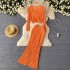 European and American style simple and fashionable thin knitted suit for women, with a distressed design and a high waist slimming long skirt