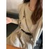 Early autumn Korean style sleeveless round neck pleated dress paired with fashionable long sleeved loose knit sweater two-piece set