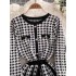 Mingyuan Xiaoxiangfeng Qianniao plaid knitted dress for women in winter, high-quality professional temperament, high waisted umbrella shaped A-line skirt