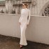 Long sleeved high neck slimming fish tail long skirt 2024 autumn new women's clothing design sense temperament slim fit hip hugging dress