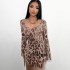 Animal pattern printed backless long sleeved dress, European and American 2024 autumn new women's sexy spicy girl short skirt