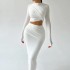 European and American style ins foreign trade solid color round neck irregular long sleeved crop top casual half skirt two-piece set trendy women