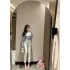 Classic vintage style straight leg jeans for women in early autumn 2024, slim fit and versatile, solid color cropped pants