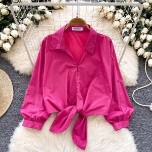 Extremely simple and high-end Polo collar shirt for women in autumn, with loose and slimming straps and bubble sleeves designed for a unique and elegant style