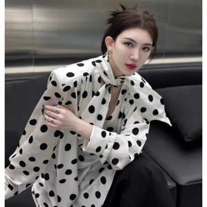 French black and white contrasting polka dot shirt with hollowed out bow collar, long sleeved vacation style dress top