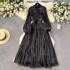 High end dress for women in early spring 2024, new style with a stand up collar, heart mechanism, pleated waist, long style, bubble sleeve dress