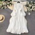 High end dress for women in early spring 2024, new style with a stand up collar, heart mechanism, pleated waist, long style, bubble sleeve dress