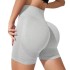 Cross border European and American seamless sports yoga shorts, peach hip lifting sports pants, belly hugging fitness pants, three part pants for women