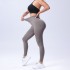 Cross border European and American solid color seamless peach hip high waist tight V-waist yoga pants for sports running and fitness, cropped pants