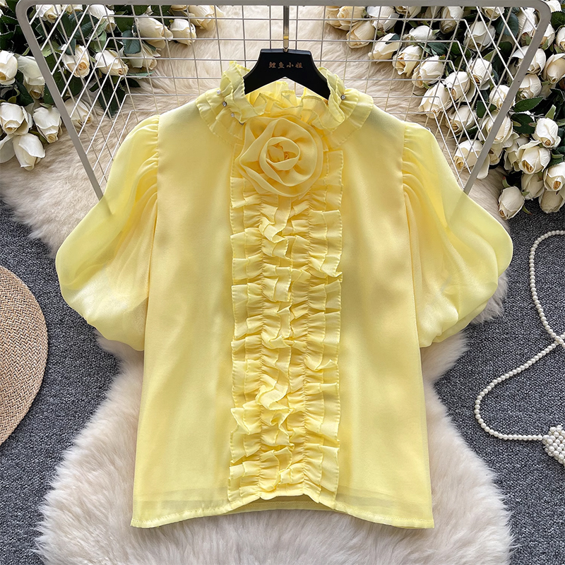 Light luxury palace style bubble sleeve shirt for women in summer, with a loose and slimming design adorned with black fungus edges and diamonds, exuding a feminine temperament