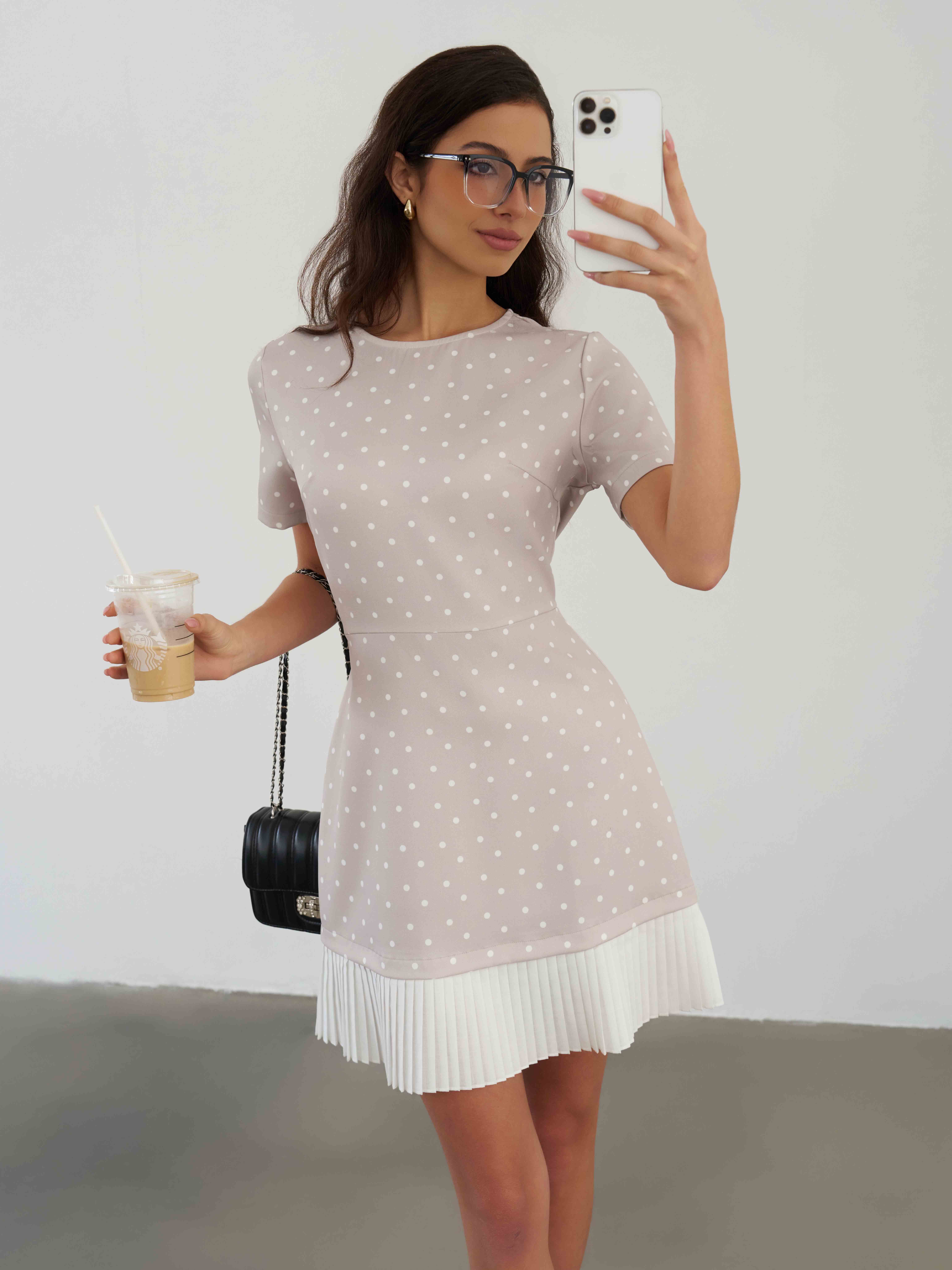 European and American fashion polka dot color blocked pleated hem patchwork dress for office wear, short sleeved casual personality for spring and summer