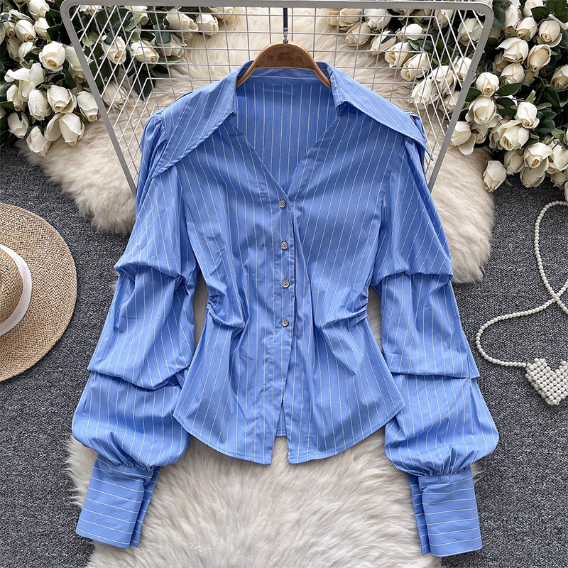 Design sense: niche pleated long sleeved lapel single breasted striped shirt for women, versatile and chic, with a cinched waist and Western style shirt for women
