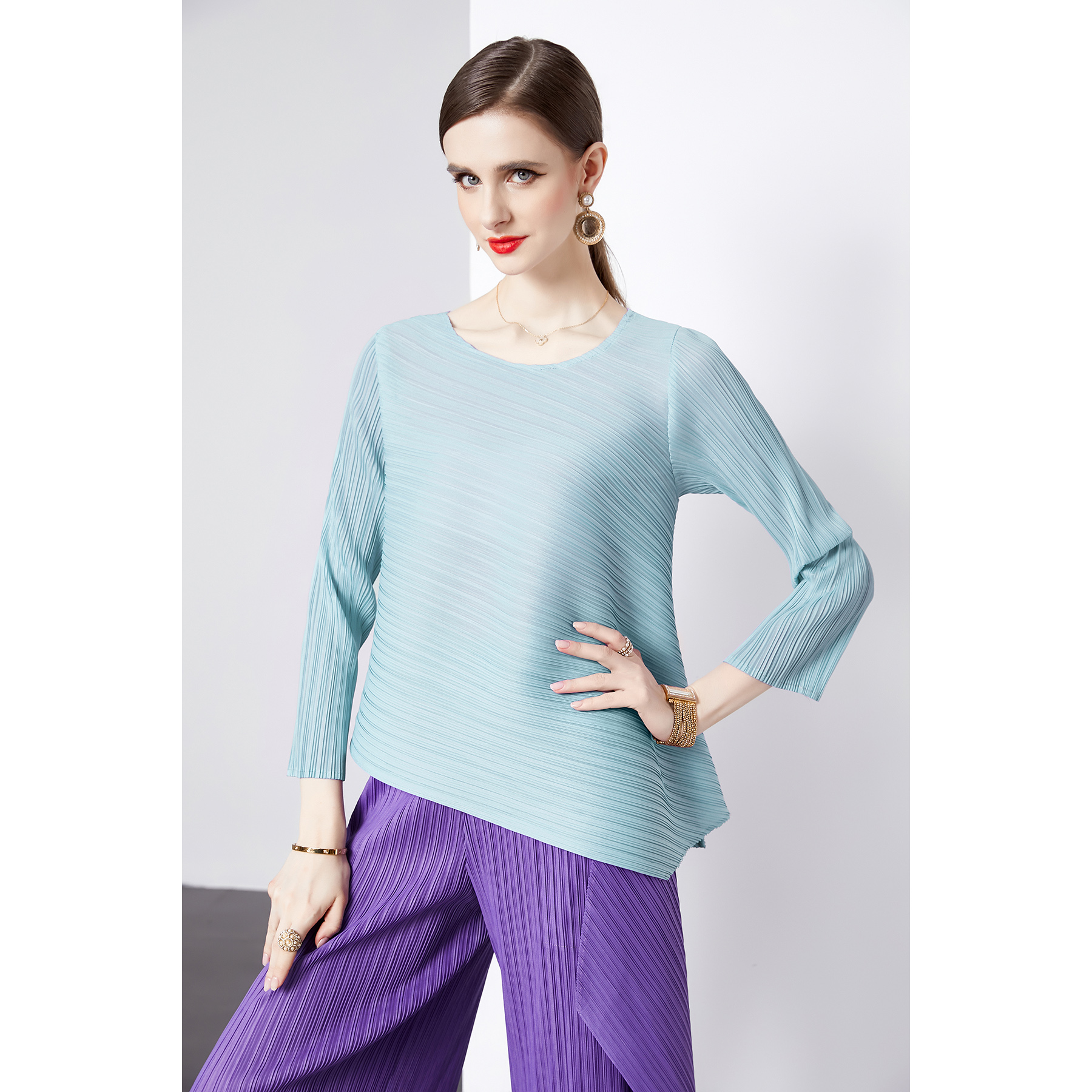Miyake Spring and Autumn long sleeved round neck simple casual irregular loose versatile solid color pleated women's fashionable high-end top