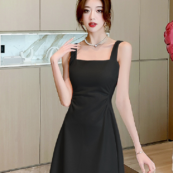 French temperament Hepburn style black and white suspender dress for children's summer 2025 new solid color long skirt