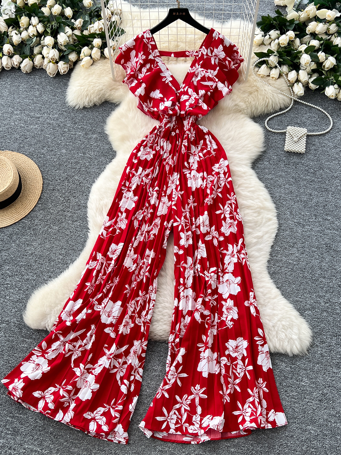 Light luxury European and American high-end printed jumpsuit women's summer lotus leaf edge deep V-neck waist design imperial horn pants