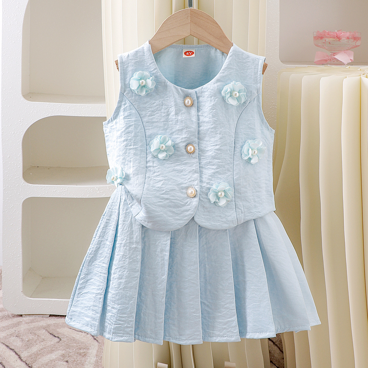 Foreign trade European and American summer new set cardigan top paired with solid color pleated skirt two-piece set