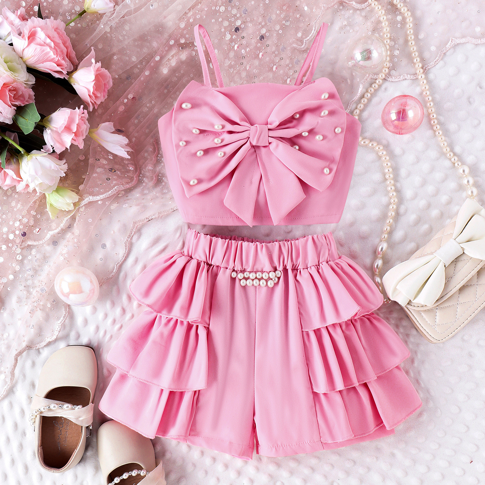 2024 New European and American Children's Clothing Foreign Trade Girls' Summer Clothing Set Pink Bow Strap Top Shorts Two Piece Set