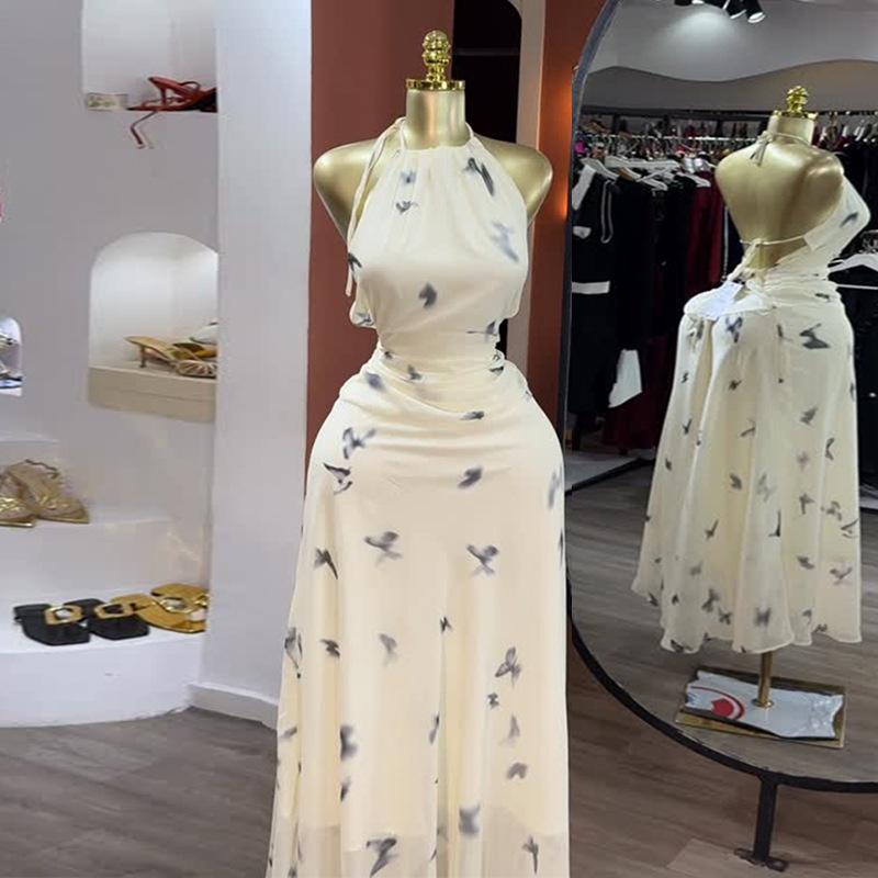 European and American women's clothing 2025 autumn new item sweet and fresh printed hanging neck, exposed back high waisted dress, long skirt