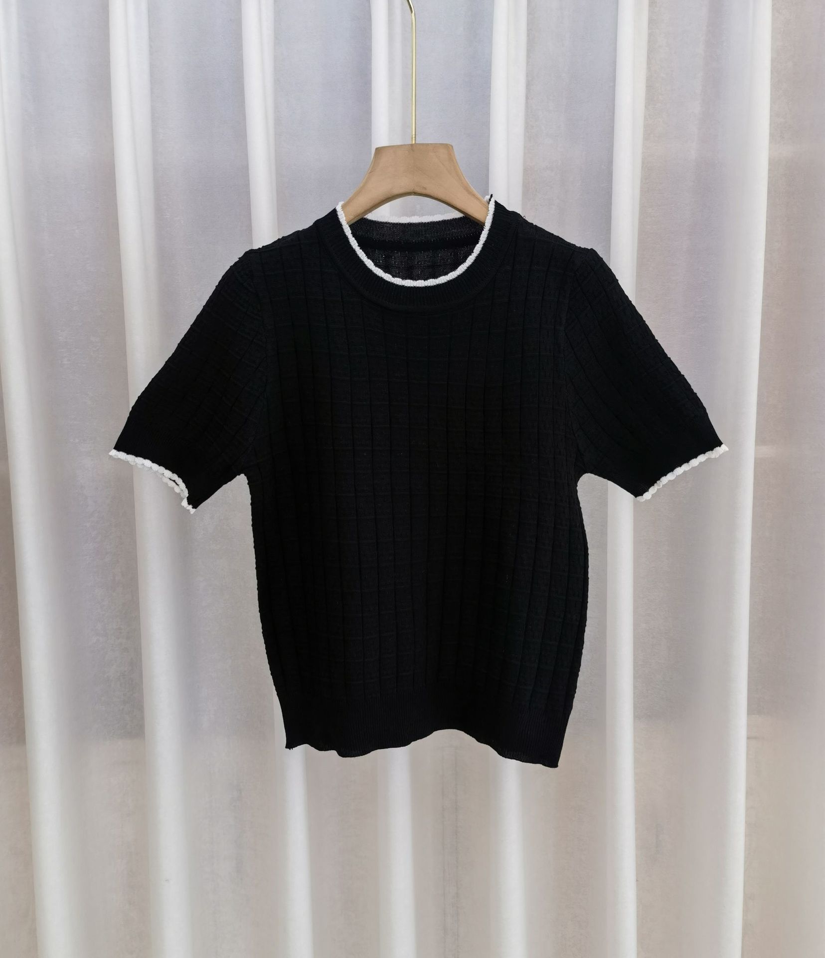 White ice silk knitted short sleeved T-shirt for women's summer 2023 new top design, niche loose round neck White ice silk knitted short sleeved T-shirt for women's summer 2023 new top design, niche loose round neck