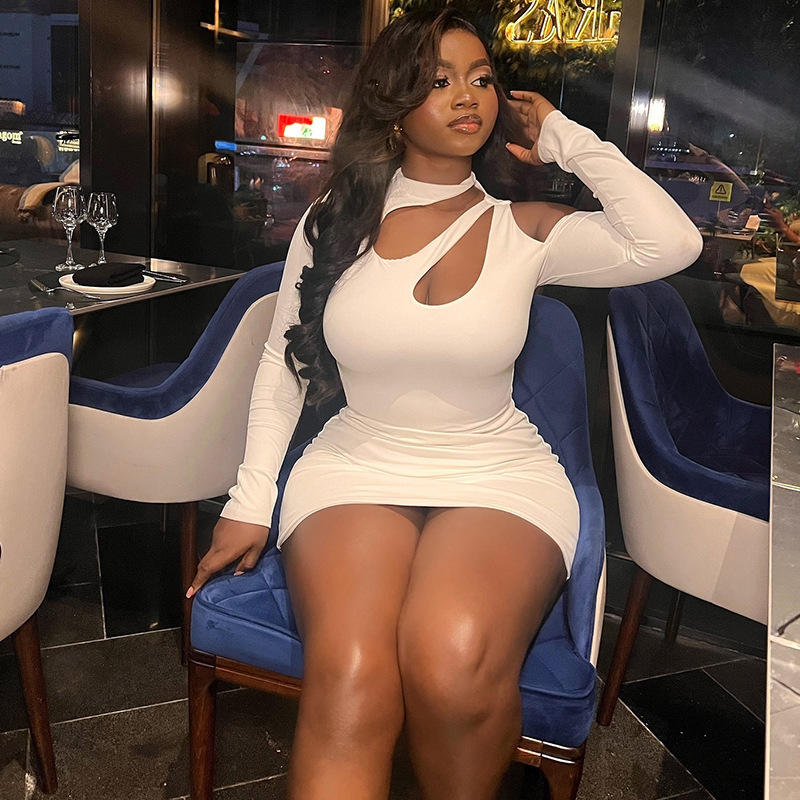 Cross border women's clothing from Europe and America, sexy, fashionable, slim fit, solid color, hollowed out, personalized off shoulder, hip hugging skirt, long sleeved stand up collar dress